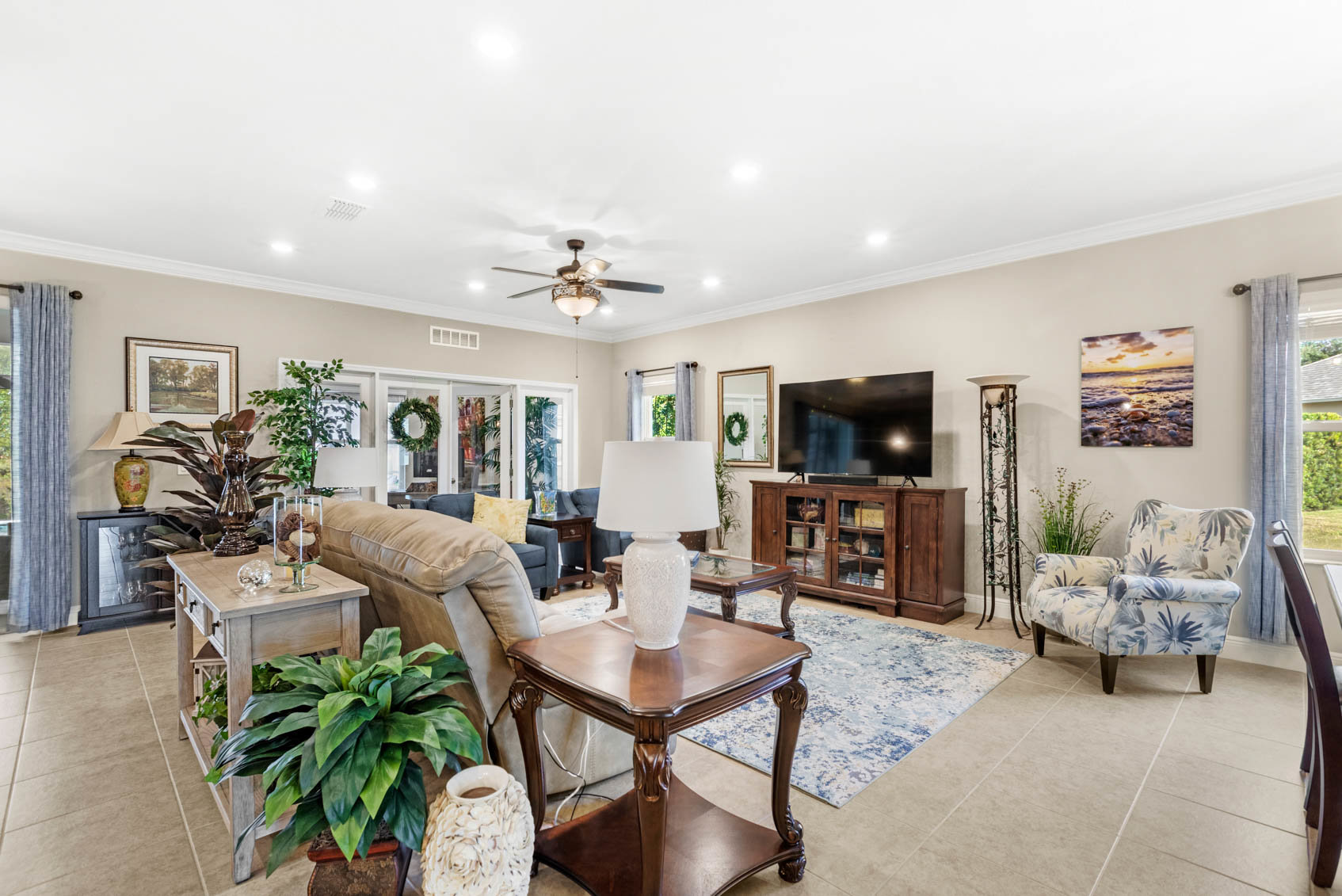 living room with couches and plants